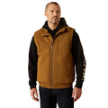 Man wearing a brown and black vest with a visible brand logo on a white background