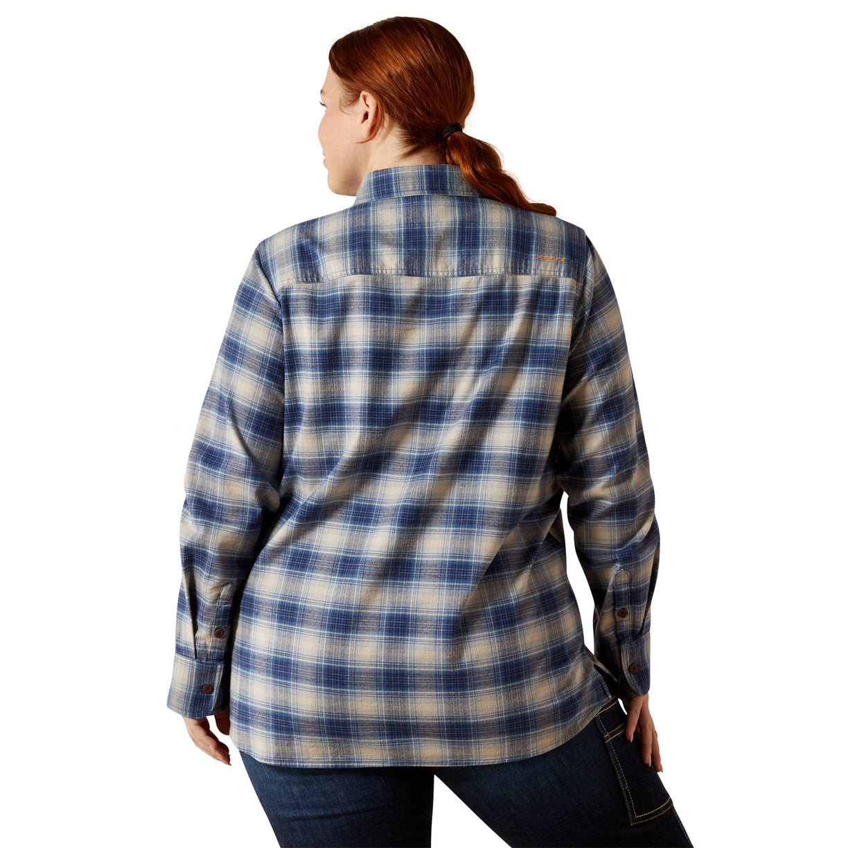 Woman wearing a blue and white plaid shirt on a white background