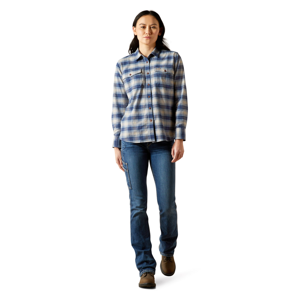 Person wearing a blue plaid shirt and jeans on a white background