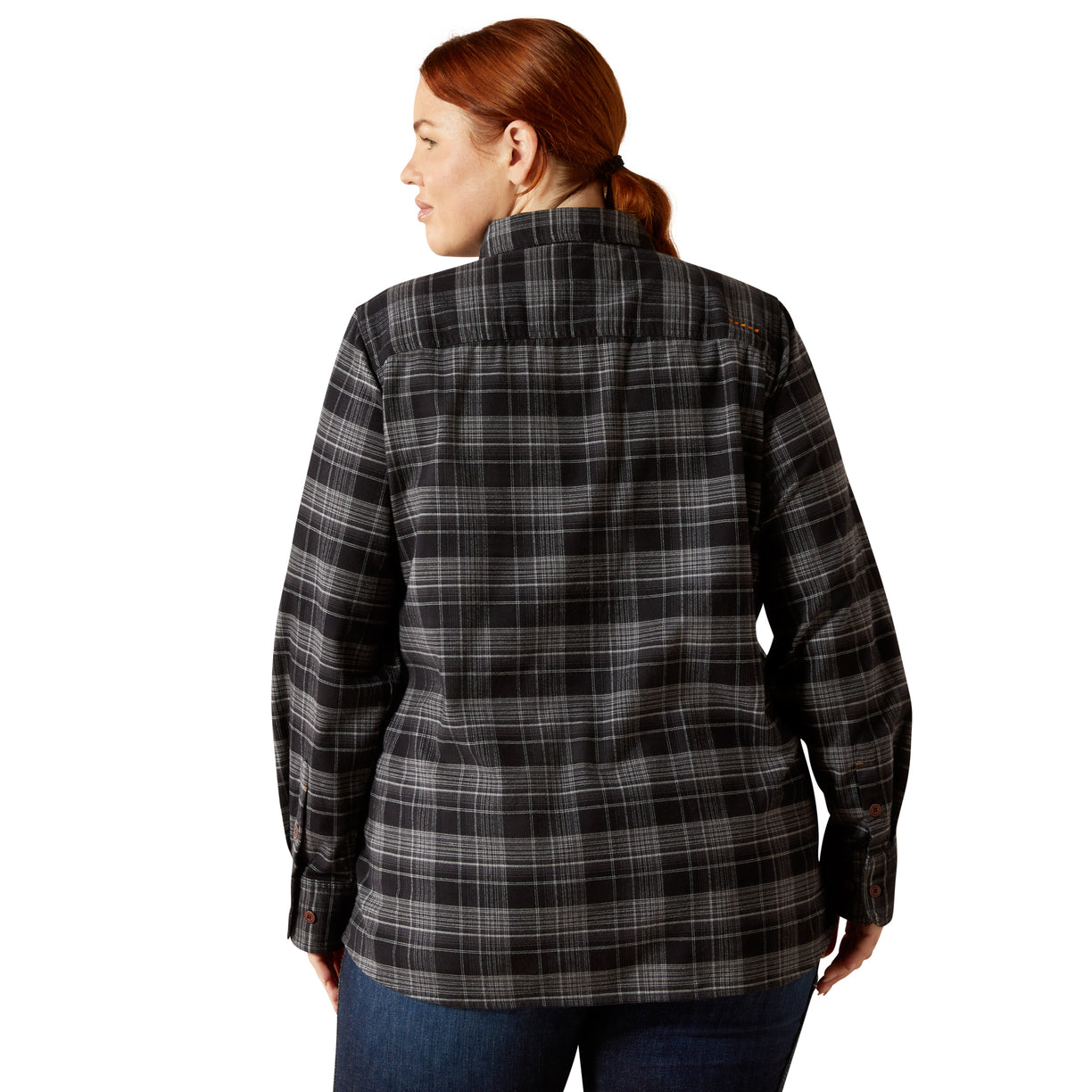 plus size woman wearing a black and gray plaid shirt on a white background