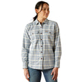 Woman wearing a plaid shirt on a white background