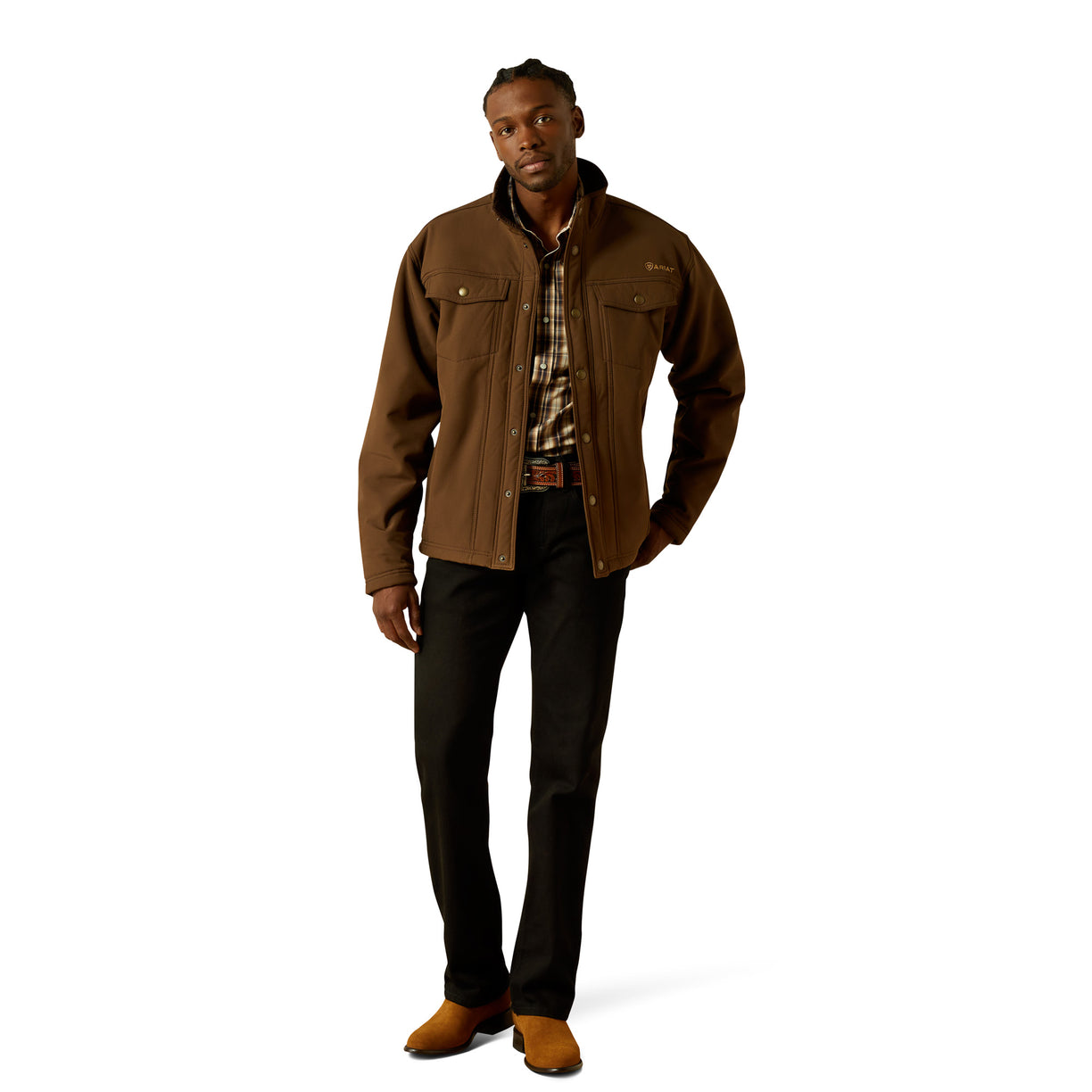 Man wearing a brown jacket and black pants on a white background