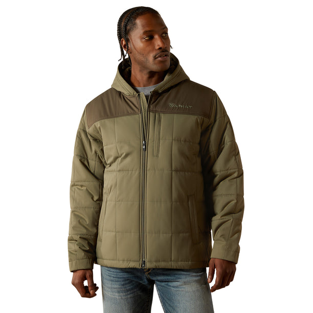 Man wearing a green jacket on a white background