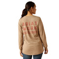Woman wearing a beige long-sleeve shirt with 'Ariat Work Est. 1993' text on the back.