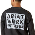Person wearing a black long-sleeve shirt with 'Ariat Work Estd. 1993' print on the back.