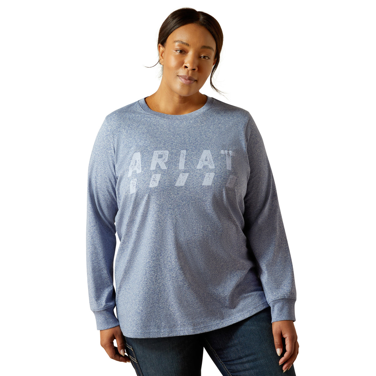 Woman wearing a gray long-sleeve shirt with 'Ariat' logo on a white background