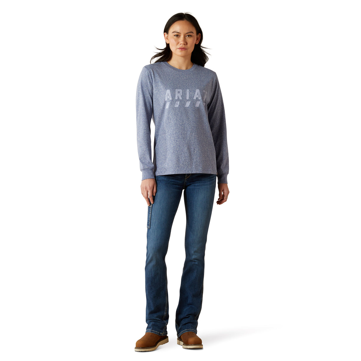 Woman wearing a gray long-sleeve shirt with 'Aria' branding and blue jeans on a white background