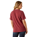 Woman wearing a red t-shirt on a white background