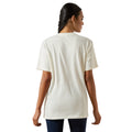 Woman wearing a plain white t-shirt on a white background