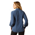 Woman wearing a blue shirt on a white background