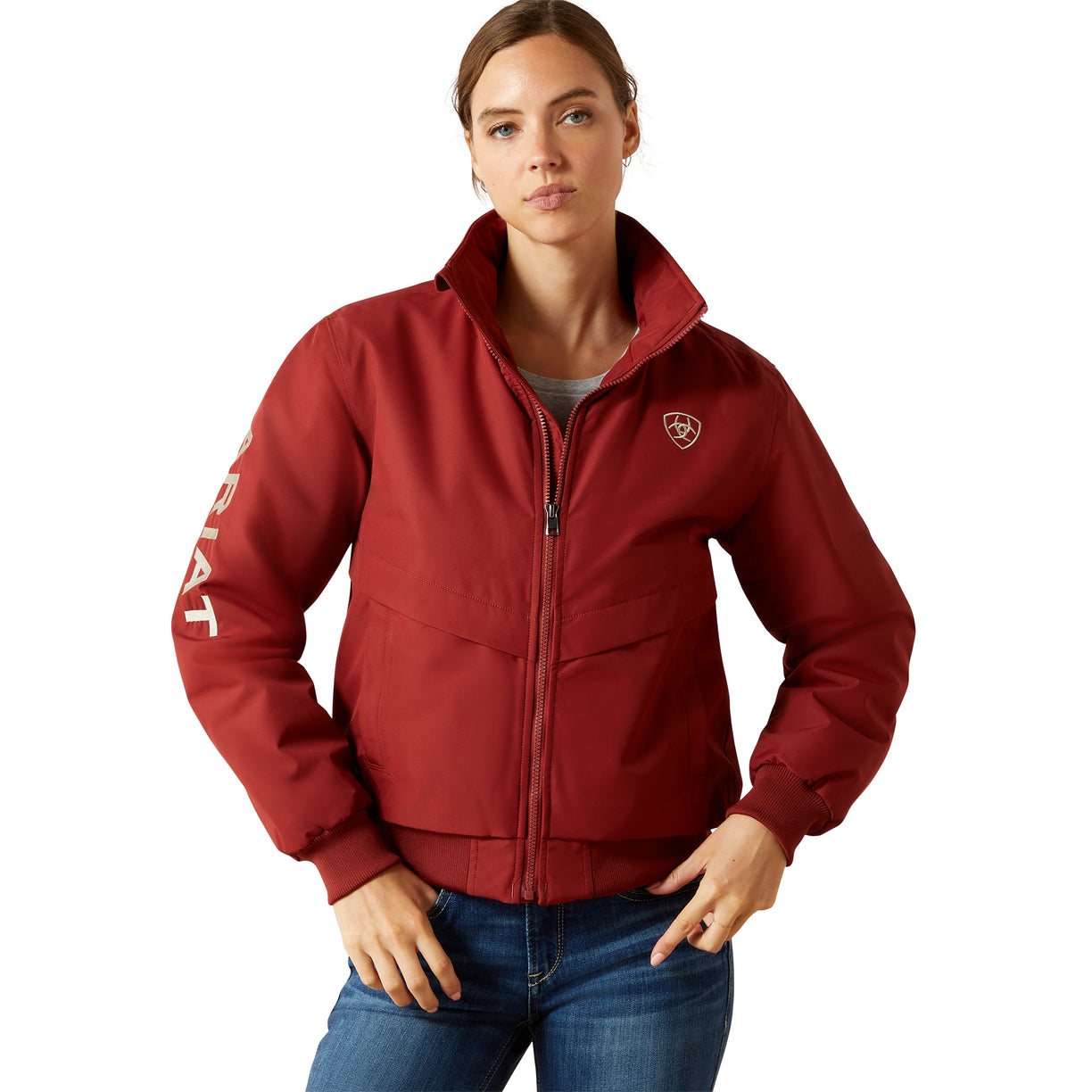 Woman wearing a red jacket with a brand logo on a white background