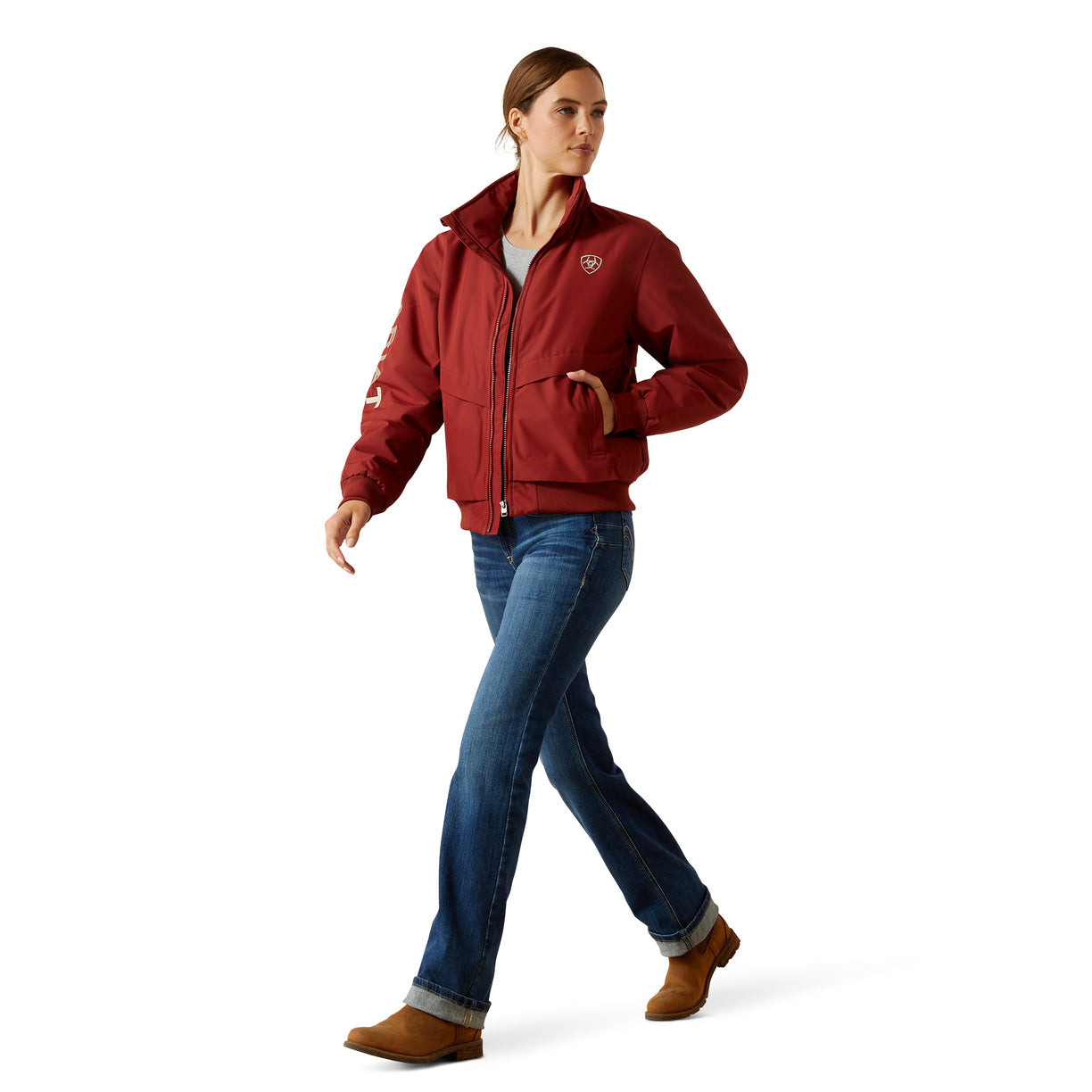 Woman wearing a red jacket with a logo on a white background