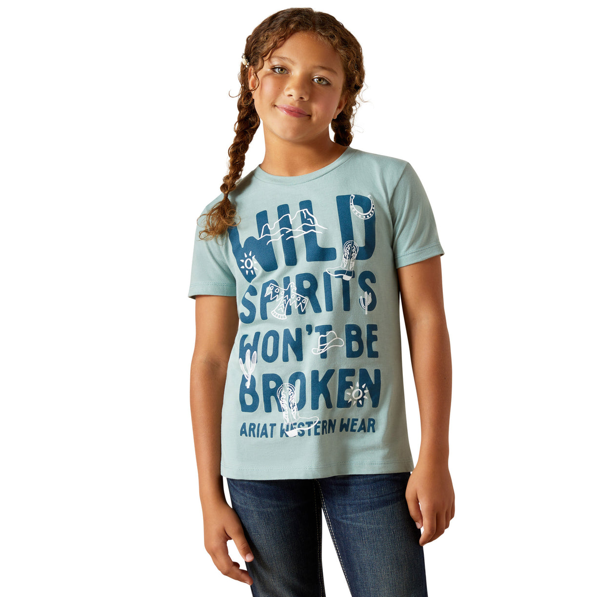 Girl wearing a light blue t-shirt with 'Wild spirits won't be broken' text, standing against a white background.