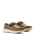 Pair of brown shoes with white soles on a white background