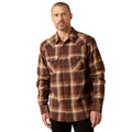 Man wearing a brown plaid shirt on a white background