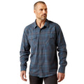 Man wearing a blue plaid shirt on a white background