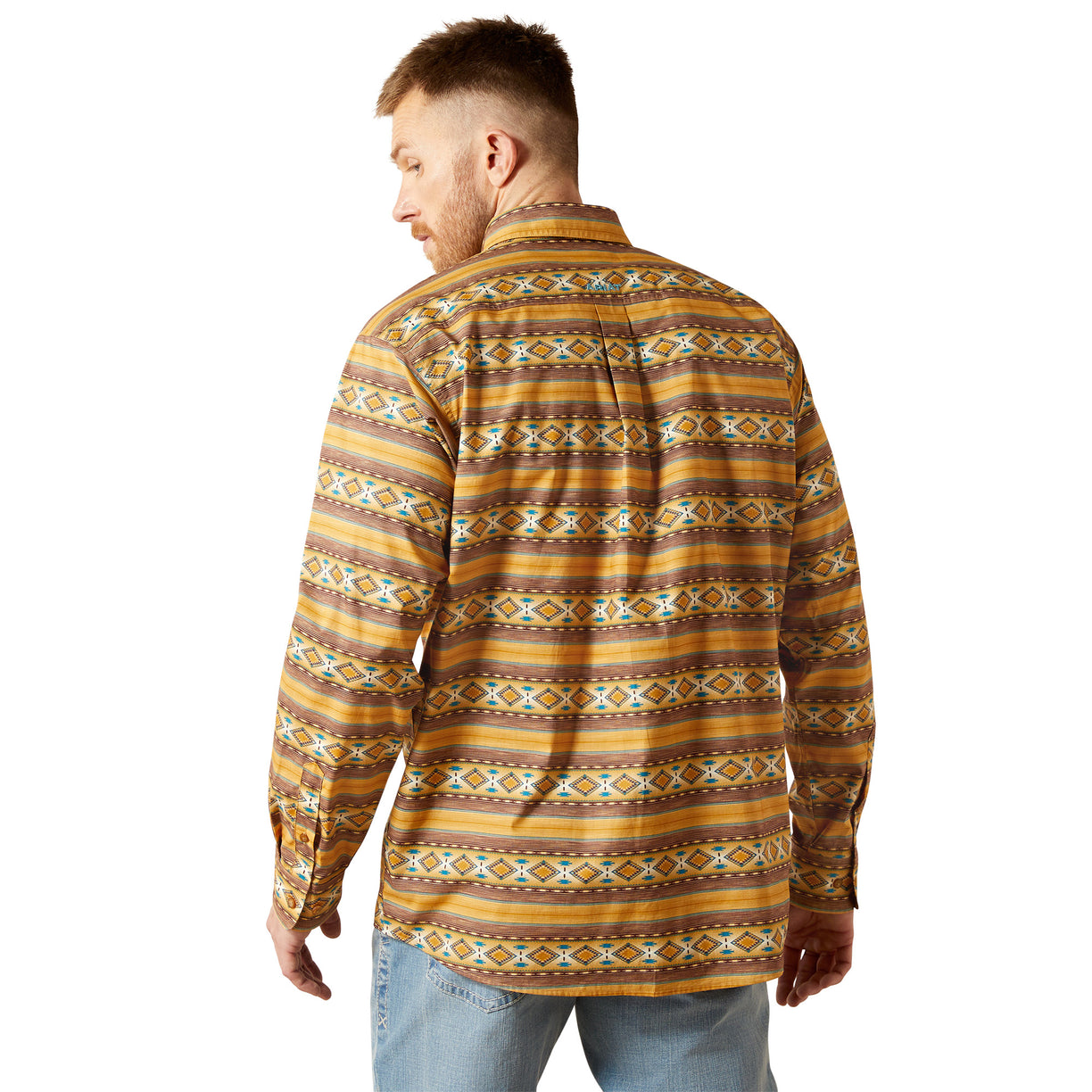 Man wearing a patterned shirt on a white background