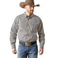 Man wearing a plaid shirt, jeans, and a cowboy hat on a white background