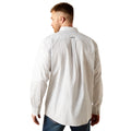 Man wearing a light gray patterned shirt with a brand logo on the back, standing against a white background.