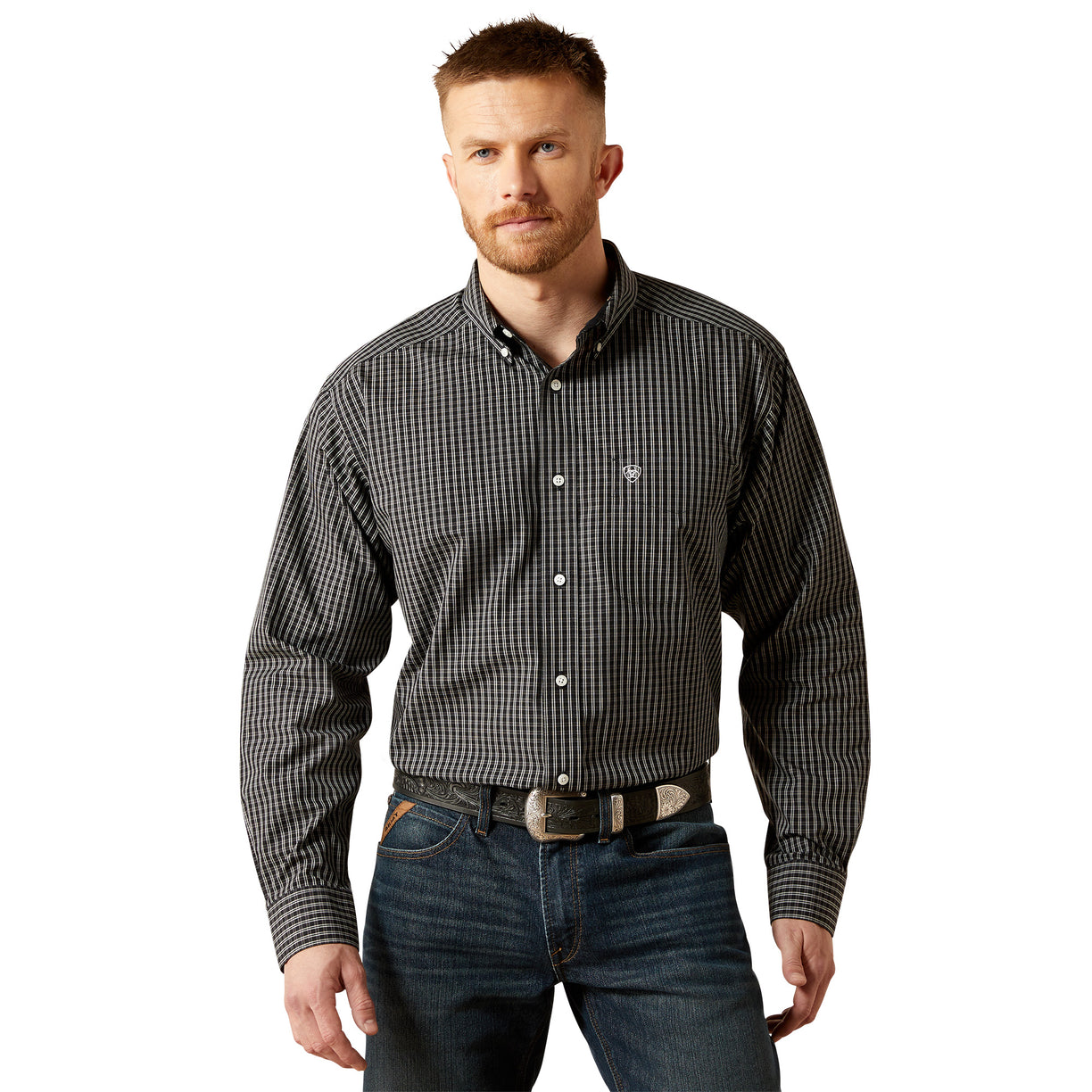 Man wearing a checkered shirt and jeans on a white background