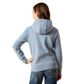 Person wearing a light blue hoodie from behind on a white background