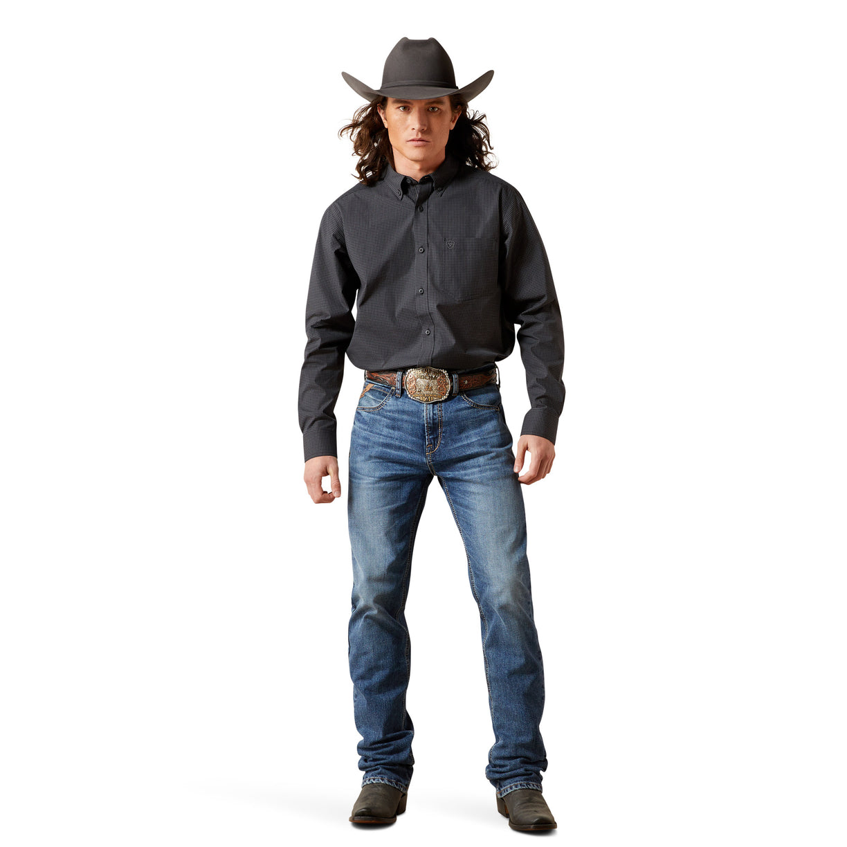 Man wearing a black shirt, blue jeans, and a cowboy hat on a white background