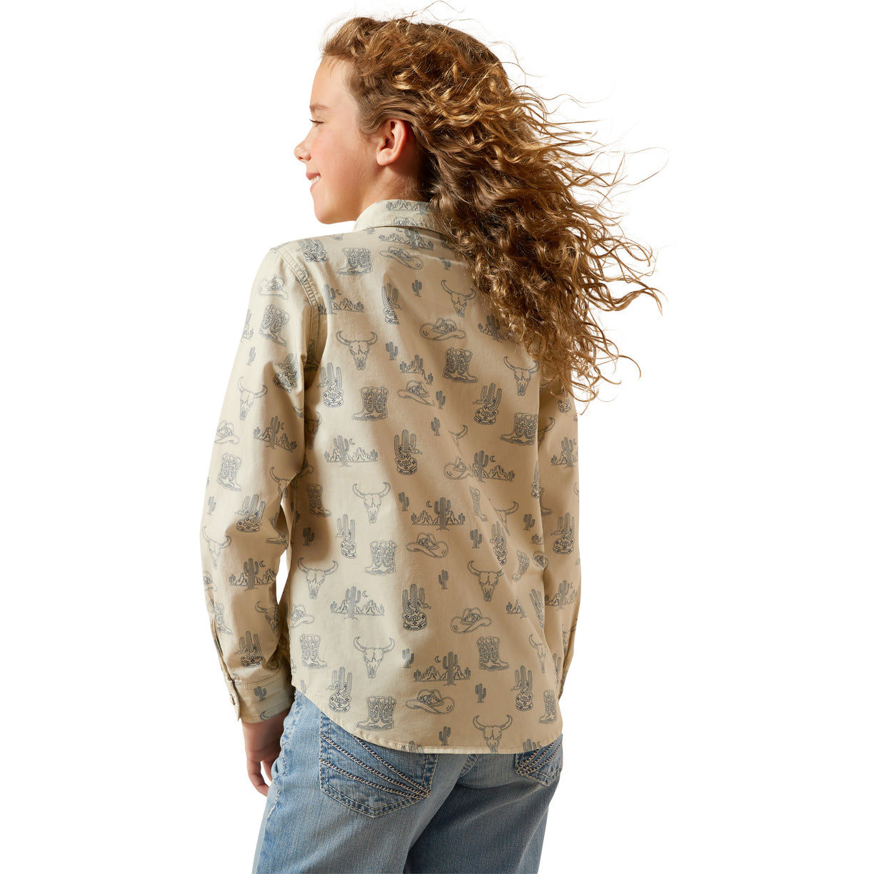 Child wearing a patterned shirt with long hair on a white background