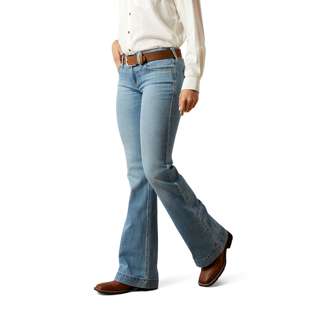 Light blue jeans worn by a person on a white background