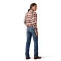 Person wearing a plaid shirt and blue jeans on a white background