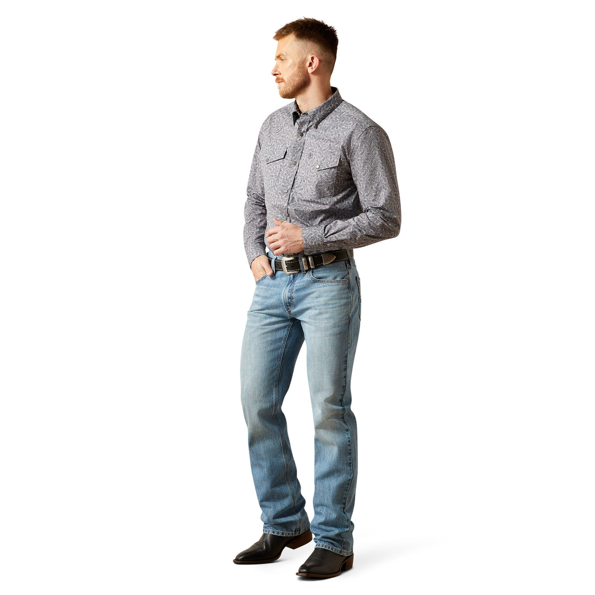 Man wearing a gray checkered shirt and blue jeans on a white background