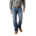 Person wearing a plaid shirt, workwear, outback, jeans, and brown boots on a white background, cotton, straight leg. 