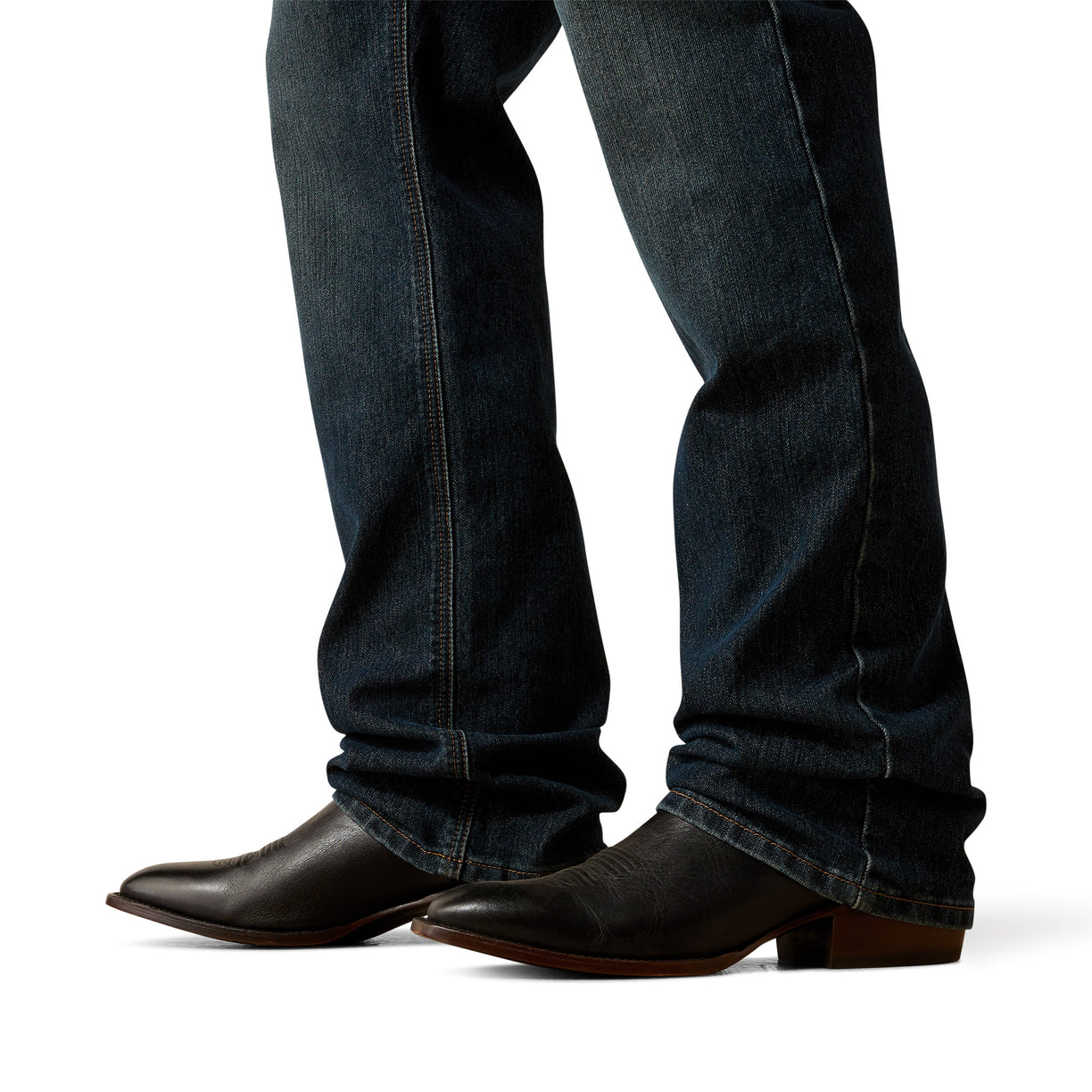 Dark blue jeans and brown boots on a white background
