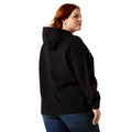 Person wearing a black hoodie on a white background