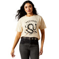 Woman wearing a beige t-shirt with 'Wild West' graphic design on a white background