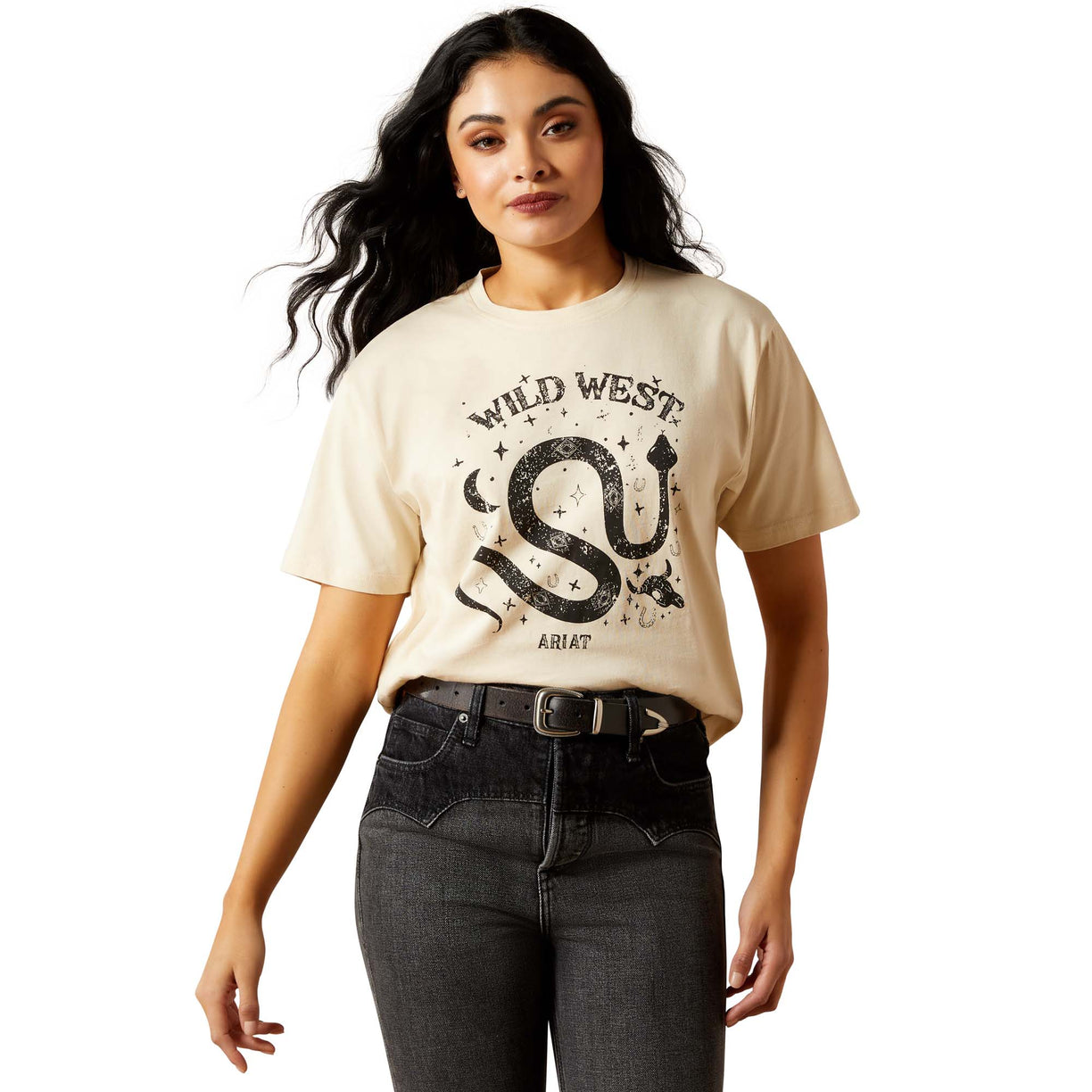 Woman wearing a beige t-shirt with 'Wild West' graphic design on a white background