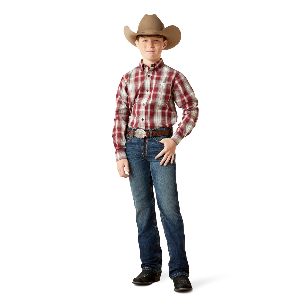 Child wearing a cowboy hat, plaid shirt, and jeans on a white background