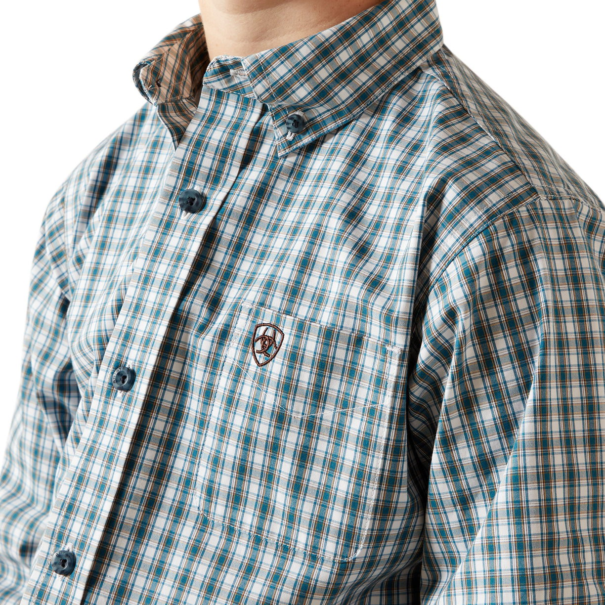 Close-up of a person wearing a green and white plaid shirt with a brand logo on a white background