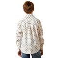 Person wearing a white patterned shirt on a white background