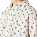 White shirt with a patterned design on a white background