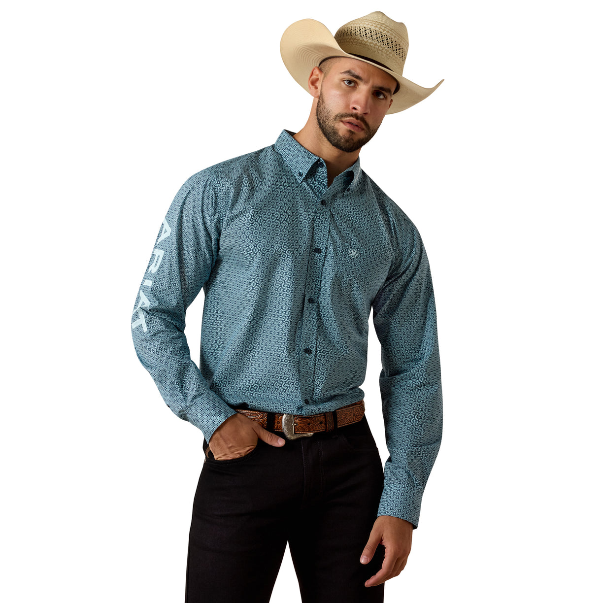 Man wearing a blue patterned shirt, black pants, and a cowboy hat on a white background