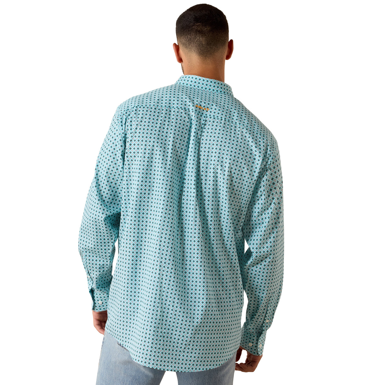 Man wearing a patterned shirt on a white background