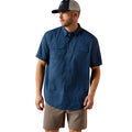 Navy VentTEK Outbound Classic Fit Shirt with a subtle micro-print, short-sleeve with two chest pockets, worn with a cap and khaki shorts.
