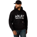 Man wearing a black hoodie with 'Ariat Work' logo on a white background