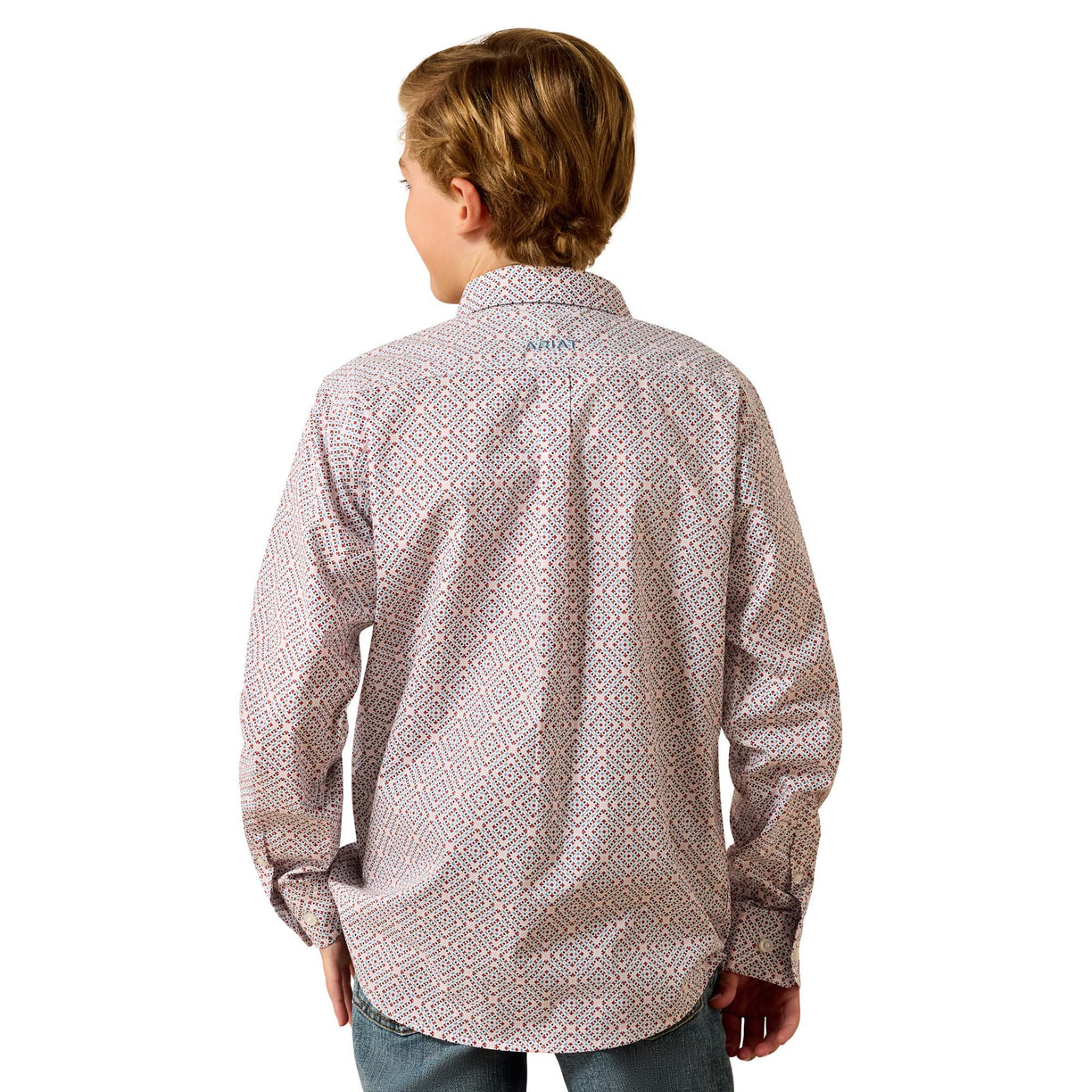 Person wearing a patterned shirt on a white background