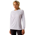 Lightweight long sleeve top in a pale lilac shade, worn with black pants