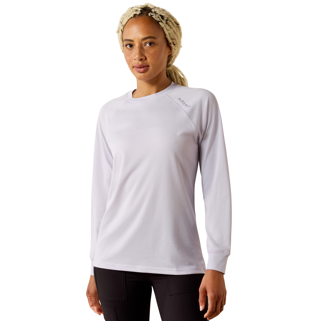 Lightweight long sleeve top in a pale lilac shade, worn with black pants