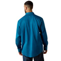 Man wearing a blue shirt on a white background
