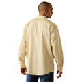 A man shown from the back wearing a light beige long-sleeve button-up shirt and blue jeans, photographed against a plain white background.
