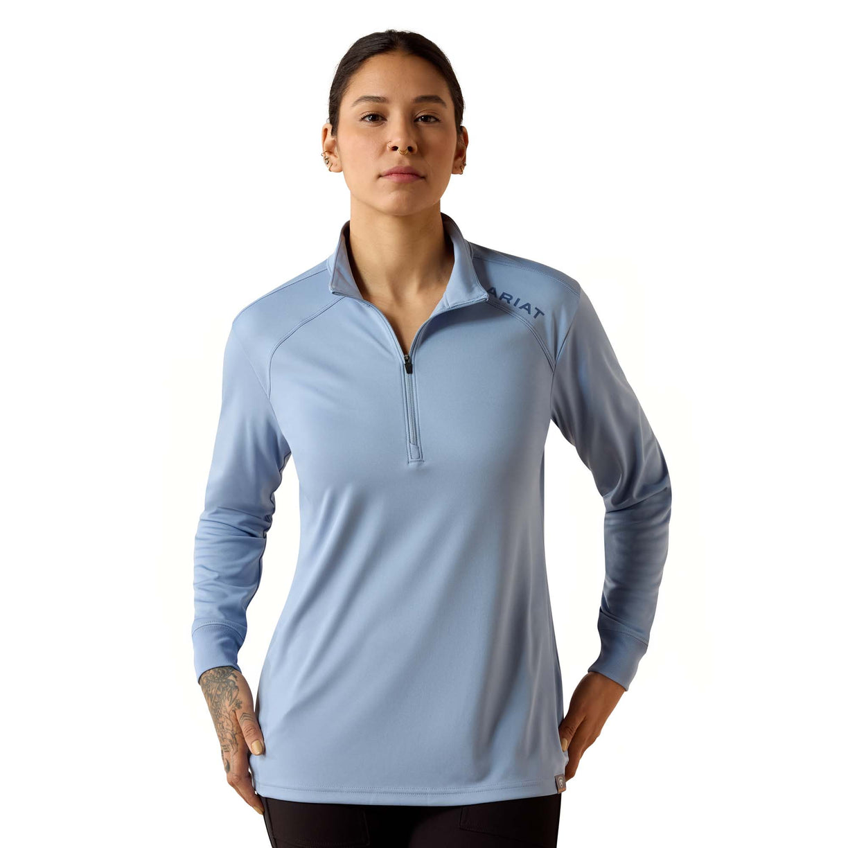 Light blue quarter-zip long sleeve top with a contrast collar