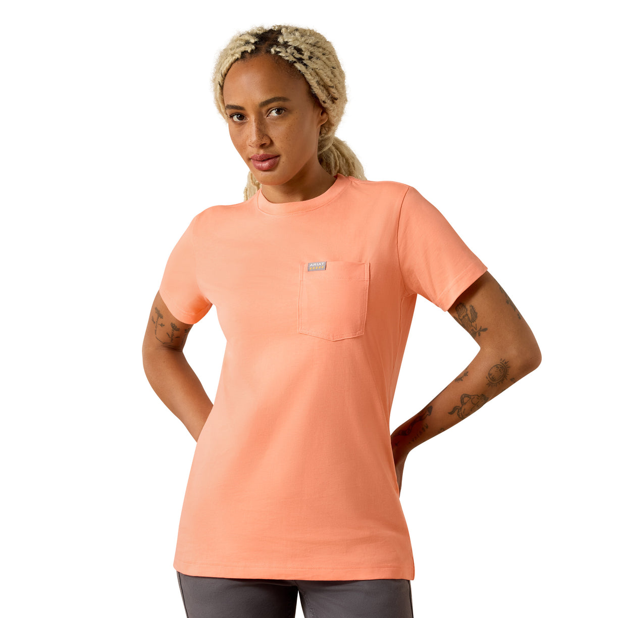 Peach-orange crewneck t-shirt with a chest pocket, front view